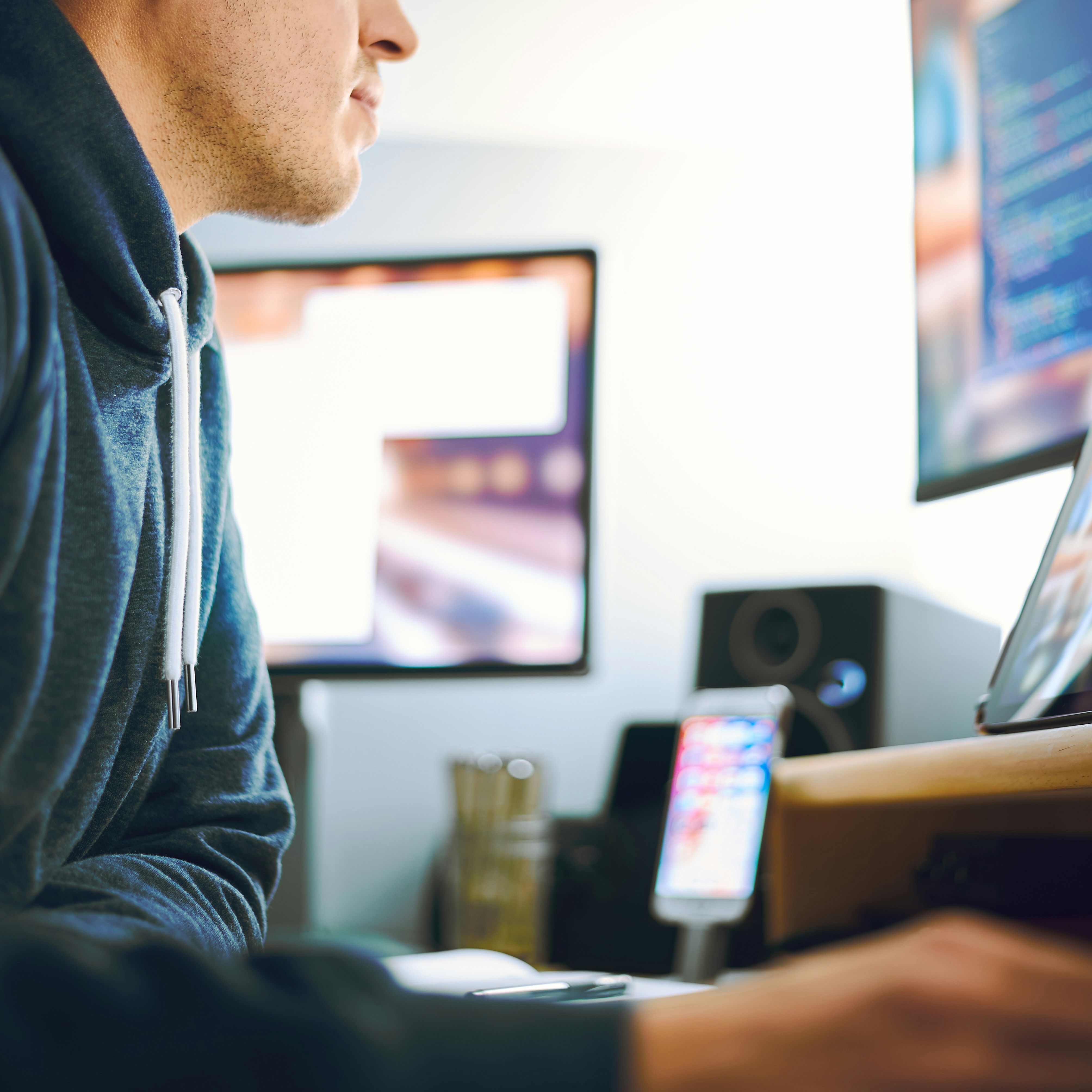 man sitting at computer